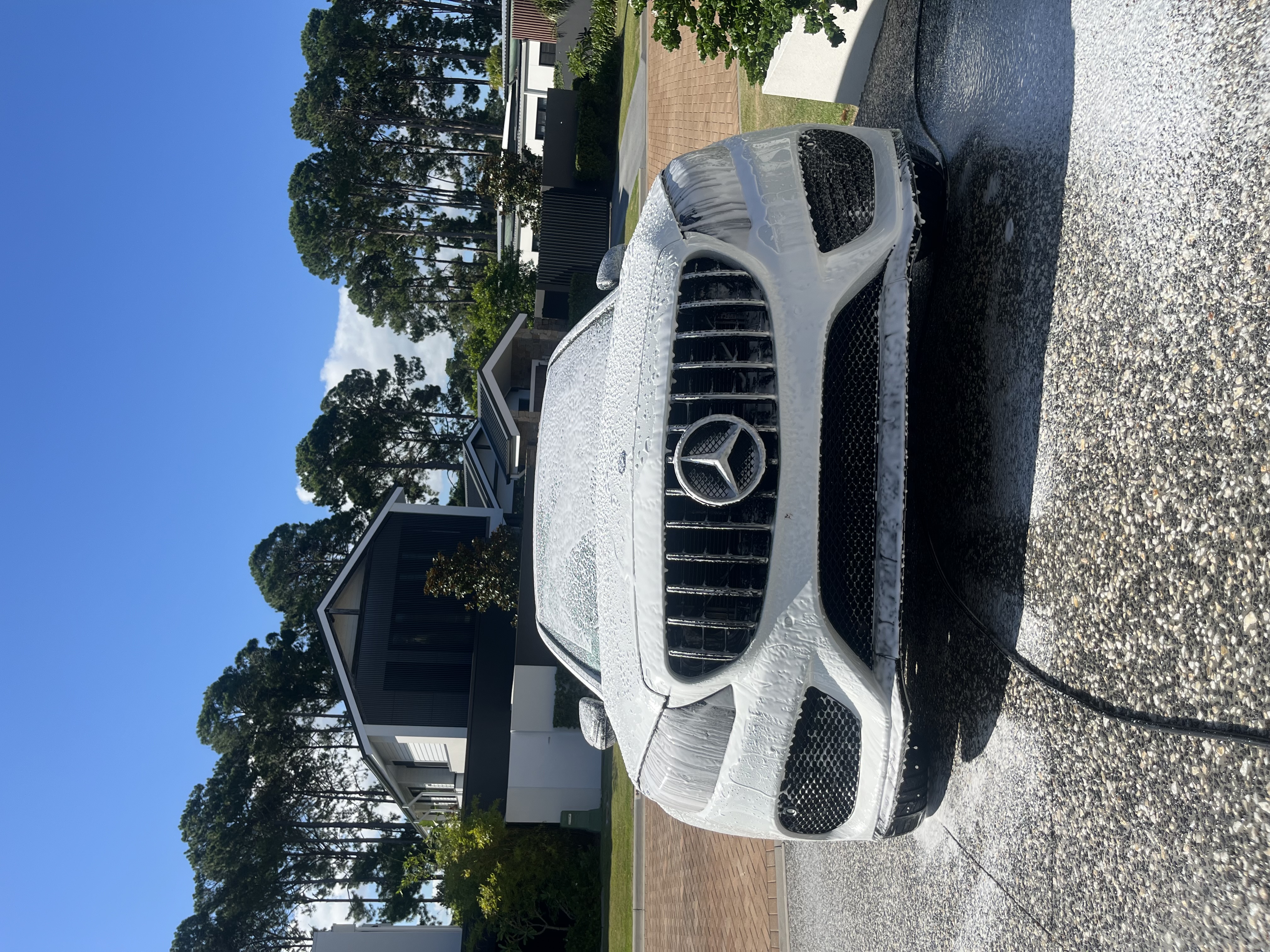 Mercedes grille during foam wash