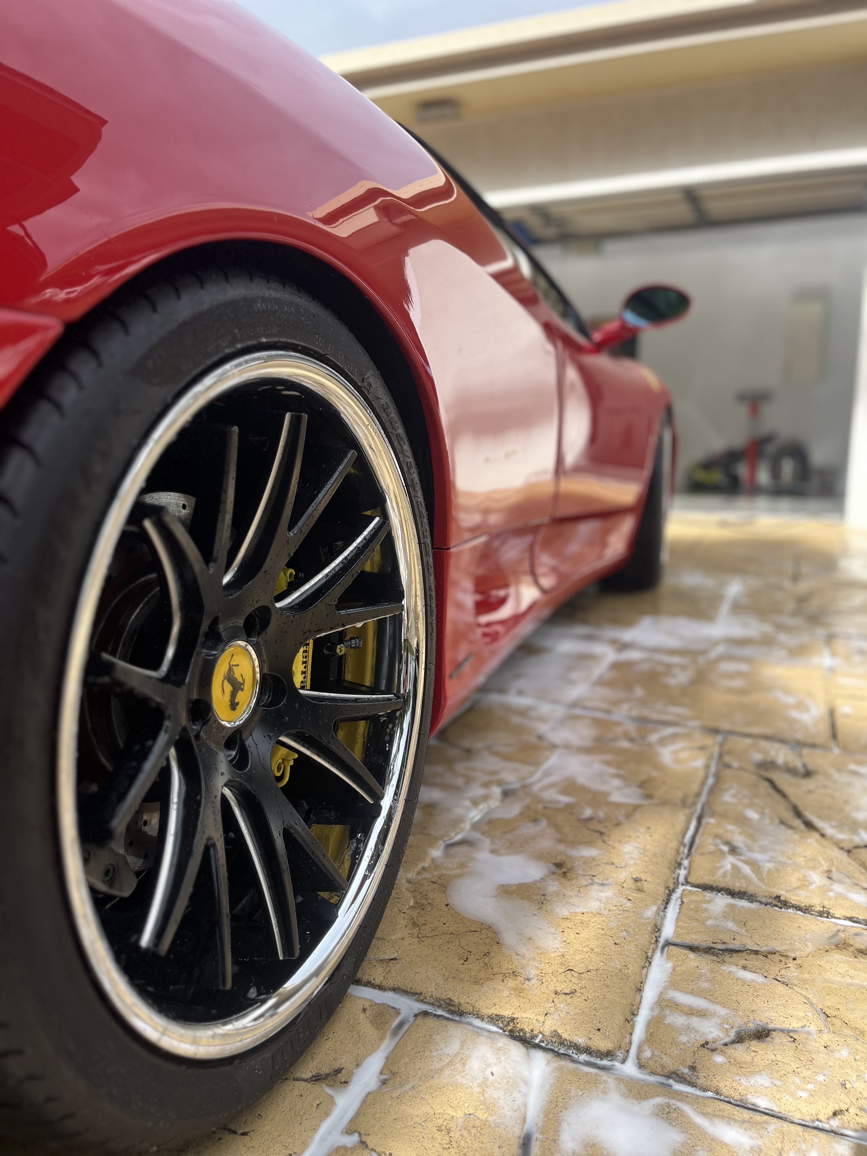Red Ferrari wheel and paint detail